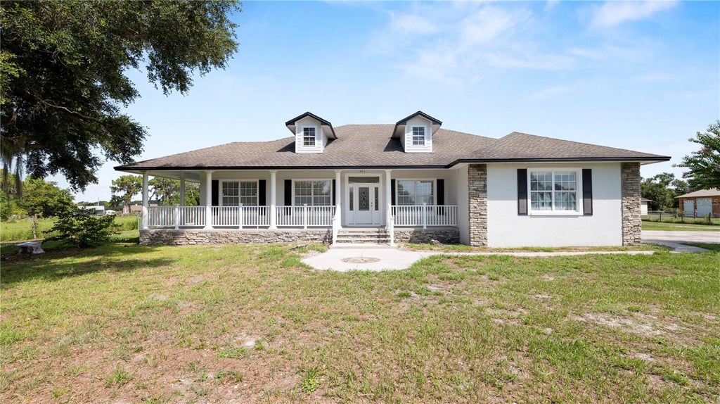 Photo of 611 Morgan Road, Winter Haven, FL 33880 (MLS # L4963328)