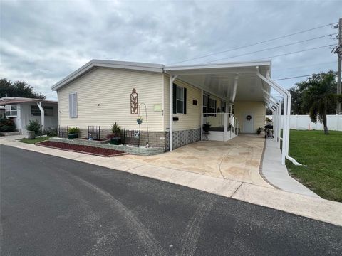 Photo of 88 Pindo Palm Street W, Largo, FL 33770 (MLS # TB8427522)