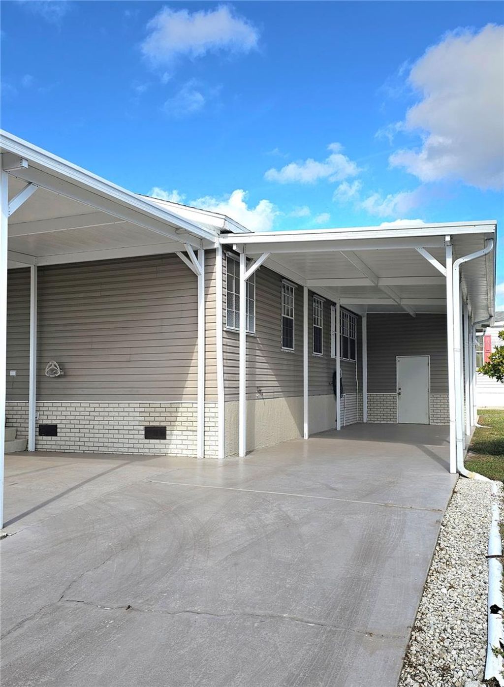 Photo of 65 Windmill Blvd, Punta Gorda, FL 33950 (MLS # C7519268)