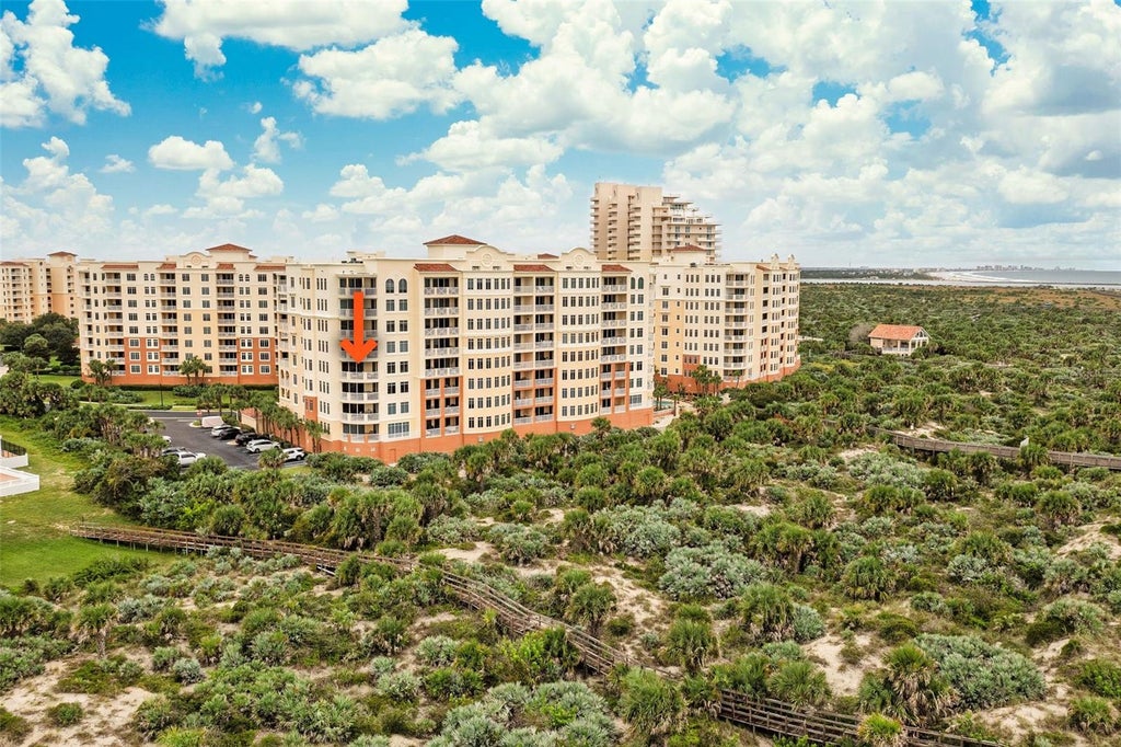 Photo of 253 Minorca Beach Way #506, New Smyrna Beach, FL 32169 (MLS # O6447226)