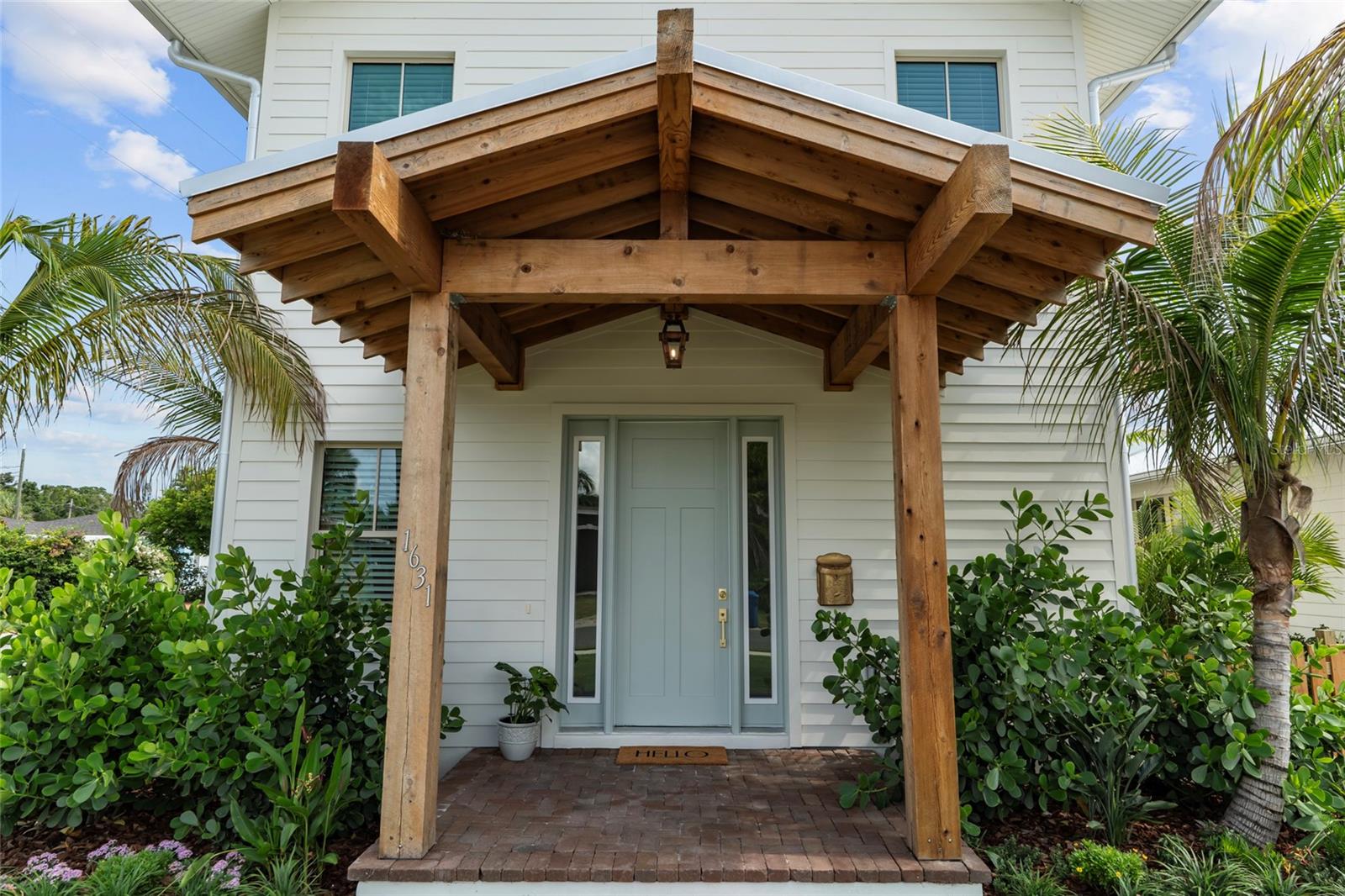 Welcome home to this adorable new construction rental in the coveted Magnolia Heights neighborhood! Built by local home builder, Coastline Development, this rental features 2 bedrooms, 1 bathroom, 1080 SFT - situated above a two car garage (which is also available at additional fee per month). From the welcoming cedar wood-beam front porch to the crisp white siding and tropical landscaping, every detail has been carefully considered. Step inside to discover an adorable foyer that flows effortlessly to the real wood staircase that leads you up throughout the rest of the home. Natural light pours in through large, thoughtfully placed windows, accentuating the open-concept layout and vaulted ceilings to create a space that feels both expansive and welcoming. Inside enjoy real wood flooring throughout, custom all wood kitchen cabinetry, soap stone countertop, stainless steel appliances, built in closet systems, spacious bedrooms, laundry closet, high end HVAC system for energy efficiency, and so much more! Rental rate to include lawn maintenance, natural gas, and pest control. Conveniently located in the heart of St. Pete - minutes to grocery, dining, breweries, shopping, and our vibrant DTSP! Easy access to I275 to Tampa or our beautiful sandy Gulf Beaches. Be the first to call this high-quality coastal retreat home — schedule your private showing today! This is 1 of 3 rentals - there is also a 1/1 (TB8410347) and 3/2 (TB8410331) available.