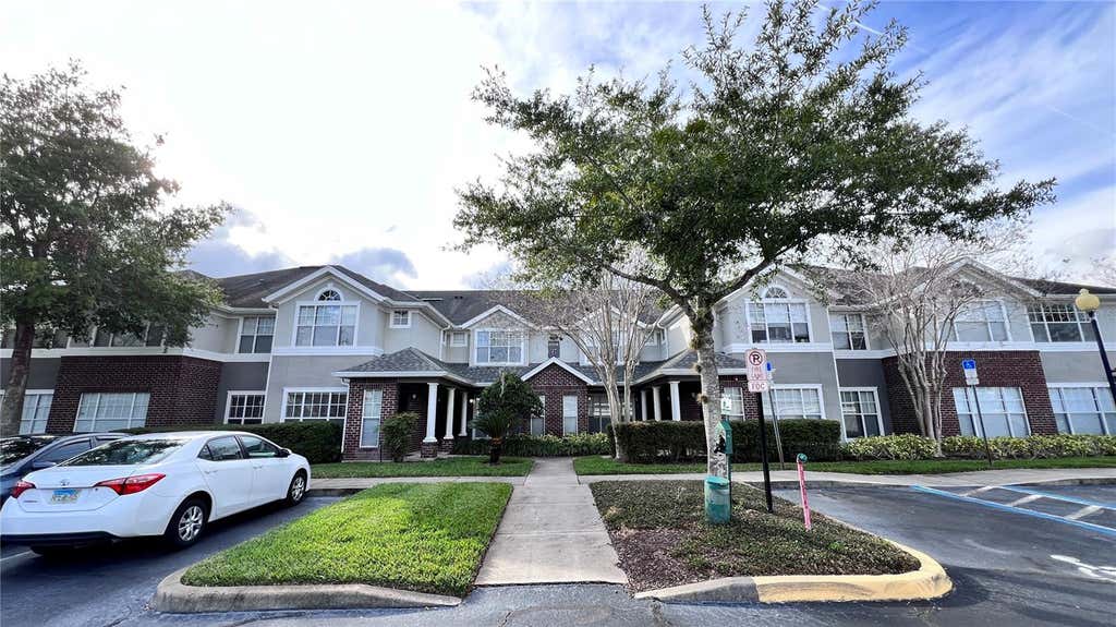 Photo of 11819 Estates Club Drive #1715, Orlando, FL 32825 (MLS # O6419595)