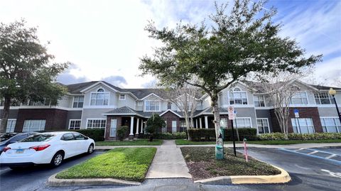Photo of 11819 Estates Club Drive #1715, Orlando, FL 32825 (MLS # O6419595)