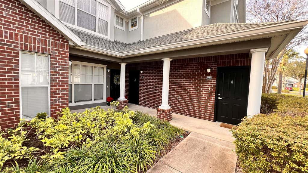 Photo of 11819 Estates Club Drive #1715, Orlando, FL 32825 (MLS # O6419595)
