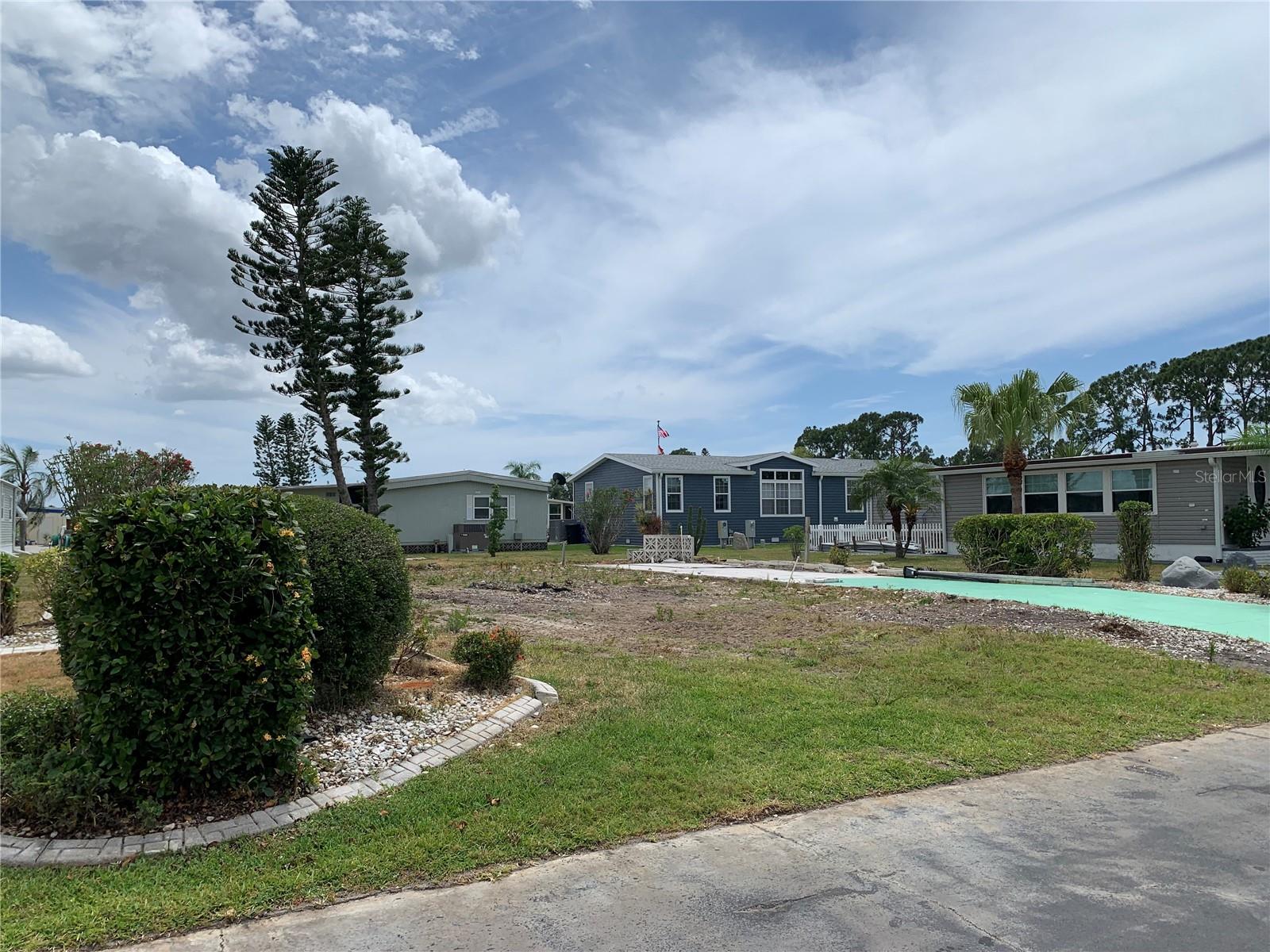 COME MAKE AN OFFER!! Very Nice Lot with Driveway already in place! Come join the ultimate lifestyle on Florida's Gulf Coast, located between Sarasota and Fort Myers with boat access to the Gulf. La Casa is a quiet 55+ community of 974 homes nestled among a variety of native trees. Spacious common grounds surround our eight lakes. Welcome To the Good Life! RECREATION, 2 Clubhouses, 2 Heated Pools. There is no shortage of activities in this community!
