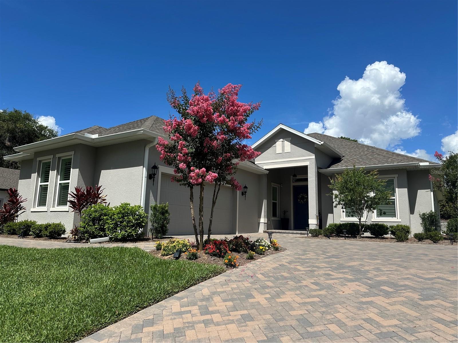 This amazing home is better than new. All the little things have been done on this beautiful, less than 1 year old home. Located in the picturesque gated golf course community of Harbor Hills with all the amenities this community has to offer. This property features a very open floor plan, with 10 foot ceilings and 8 foot doors through-out, making entering from the foyer to the great room feel extremely spacious. The kitchen features a large island with breakfast bar, 42 inch cabinets, a large walk-in pantry as well as the plentiful, gorgeous quartz counter tops making this a chef’s dream. The dining room is also spacious, open and conveniently located next to the kitchen.
This home also features a split bedroom plan with a comfortably sized primary bedroom located on the rear of the home off the great room. This boasts two walk in closets, the large 8 foot x 13 foot en-suite bathroom with amazing 5 foot x 9 foot dual head shower, nice sized linen closet with dual vanity areas as well. The nice sized second and third bedrooms are located on the opposite side of spacious home as well as the second bath. The den/office area is conveniently located just off the great room at the front of the home which could possibly be a fourth bedroom.
There is also an 18 foot x 18 foot screened porch with nearly new spa/hot tub, off the rear of the home. In the iside laundry room there is a quality Speed Queen commercial washer and dryer. The large paver double driveway leads to the oversized 2 car garage that features an additional 8 foot x 16 foot golf cart area with separate door and opener.
This property has custom shutters, multiple ceiling fans, upgraded light fixtures, a screened porch, spa/hot tub and many other conveniences that have been added since the home was new less than a year ago. The furnishings are negotiable as well, making this beautiful home turnkey ready for the new owner to just bring their personal things and start enjoying the golf course and Country Club lifestyle.