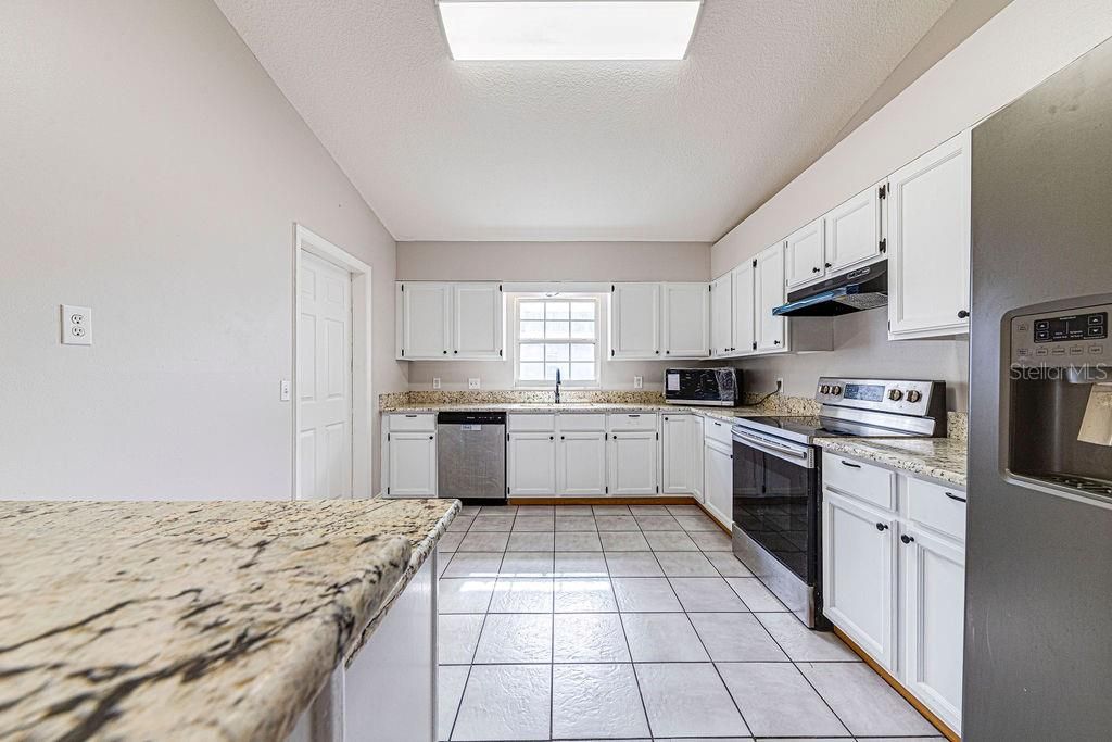 Photo of 40021 Parkinsonia Street, Lady Lake, FL 32159 (MLS # W7881765)