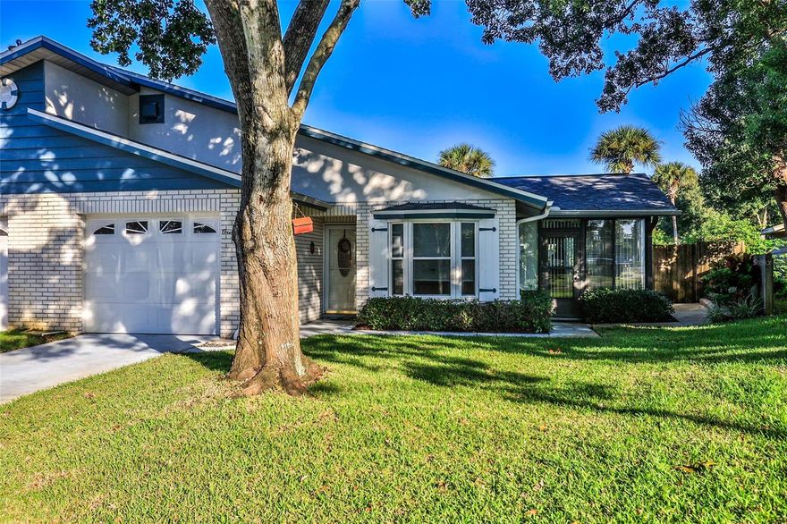 Absolutely Adorable 2 BR 2 BA home in Shangri La subdivision. Beautiful shade trees create a park-like setting for this wonderfully maintained home located just outside Edgewater's Hawks Park and only a short walk to the YMCA. The open floor plan is tiled throughout and easy to maintain with an in-kitchen breakfast nook overlooking the front yard and kitchen pass through to the dining area. The satillo-tiled patio has large slider type windows allowing ample air flow. The patio is accessible from the dining room as well as the front of the home and gives access to the fully privacy fenced back yard space.  The master bedroom includes a dedicated bath with updated step in shower.  With a new roof and air system in 2017, and updated windows and front door, this opportunity won't last long.  Make an appointment today to see this home in person. ;Water: City