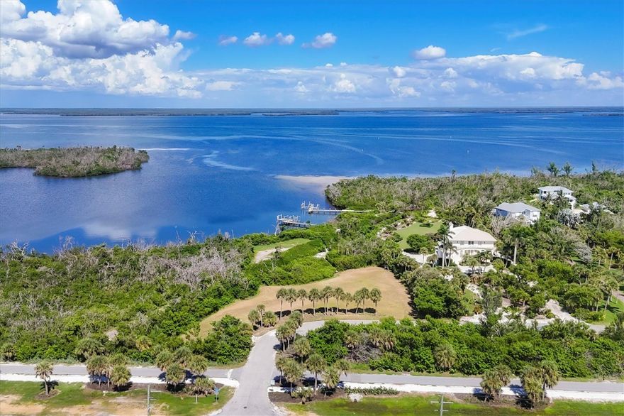 Embrace island living on this pristine 1.5-acre waterfront lot set along the peaceful shores of Gasparilla Sound, just minutes from the renowned fishing grounds of Charlotte Harbor, Florida. Cleared, construction-ready, and equipped with utilities, this remarkable property also includes more than 24,000 square feet of submerged lands. Take in sweeping water views from your future home, highlighting the true essence of bayfront living with roughly 150 feet of bay frontage. A private boardwalk and dock—featuring two lifts—offer effortless access to the water for boating and fishing excursions. Bordering a tranquil preservation area, this parcel creates a secluded retreat where you can build your ideal island residence surrounded by nature and striking water vistas. Situated in one of Florida’s premier fishing regions, you’ll enjoy quick access to some of the state’s best tarpon, snook, and redfish waters—right from your own backyard.