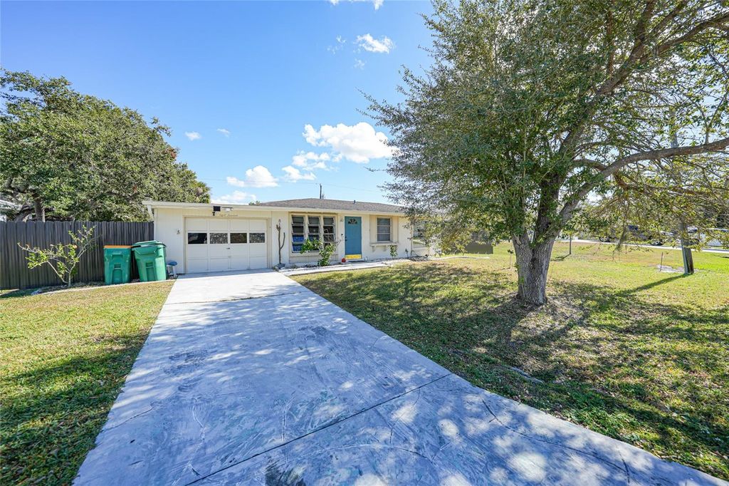 Photo of 819 Haleybury Street NW, Port Charlotte, FL 33948 (MLS # C7518590)