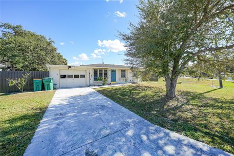 Photo of 819 Haleybury Street NW, Port Charlotte, FL 33948 (MLS # C7518590)
