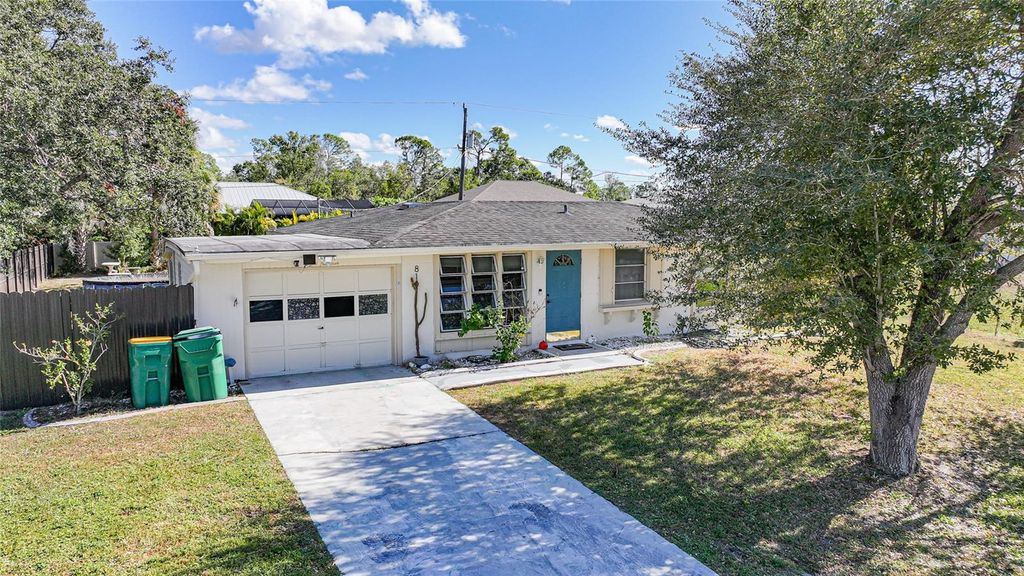 Photo of 819 Haleybury Street NW, Port Charlotte, FL 33948 (MLS # C7518590)