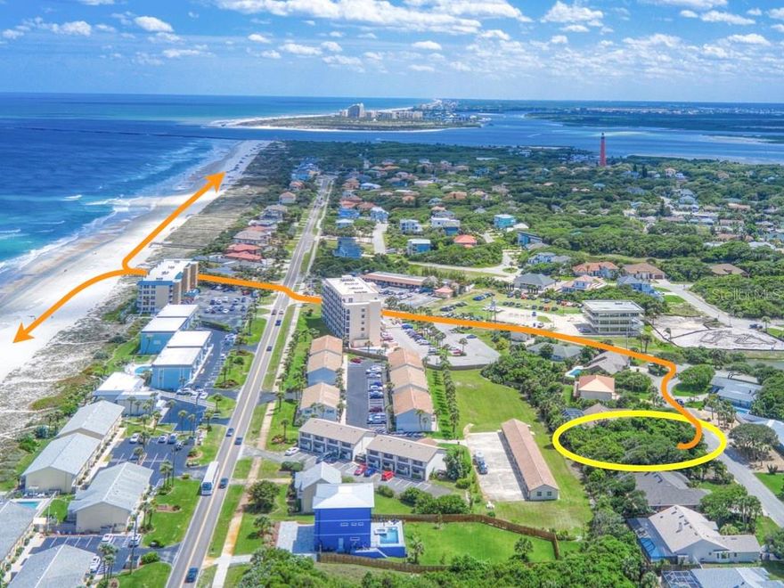 RARE OPPORTUNITY TO BUILD YOUR CASTLE BY THE SEA on this beautiful HIGH AND DRY vacant lot which is the ONLY UNDEVELOPED LOT in this EXTREMELY DESIRABLE NEIGHBORHOOD in Ponce Inlet known as OCEANSIDE VILLAGE!! No HOA! Ideally located between the Intracoastal Waterway/Halifax River and the Atlantic Ocean just ONE (1) BLOCK TO THE BEACH ACCESS of the pristine ''no drive '' sugar sand beach!! This 1/4 acre spacious lot measures 87' x 125' and is located in a community of luxurious homes. Build your dream home up to three stories (35 foot height limit) with potential ocean views!! Enjoy privacy with no homes behind! All utilities at site including city water & sewer. Walk or bike to seaside restaurants (many with entertainment ) the historic Ponce de Leon Lighthouse and Jetty Park, Marine Science Center, charter fishing, marinas, surfing, kayaking and a myriad of other. Ponce Inlet has a dog park and dog beach so Fido will be happy! Enjoy Florida coastal living at it's finest!!