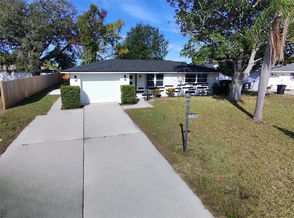 Photo of 7521 Bougenville Drive, Port Richey, FL 34668 (MLS # TB8492021)