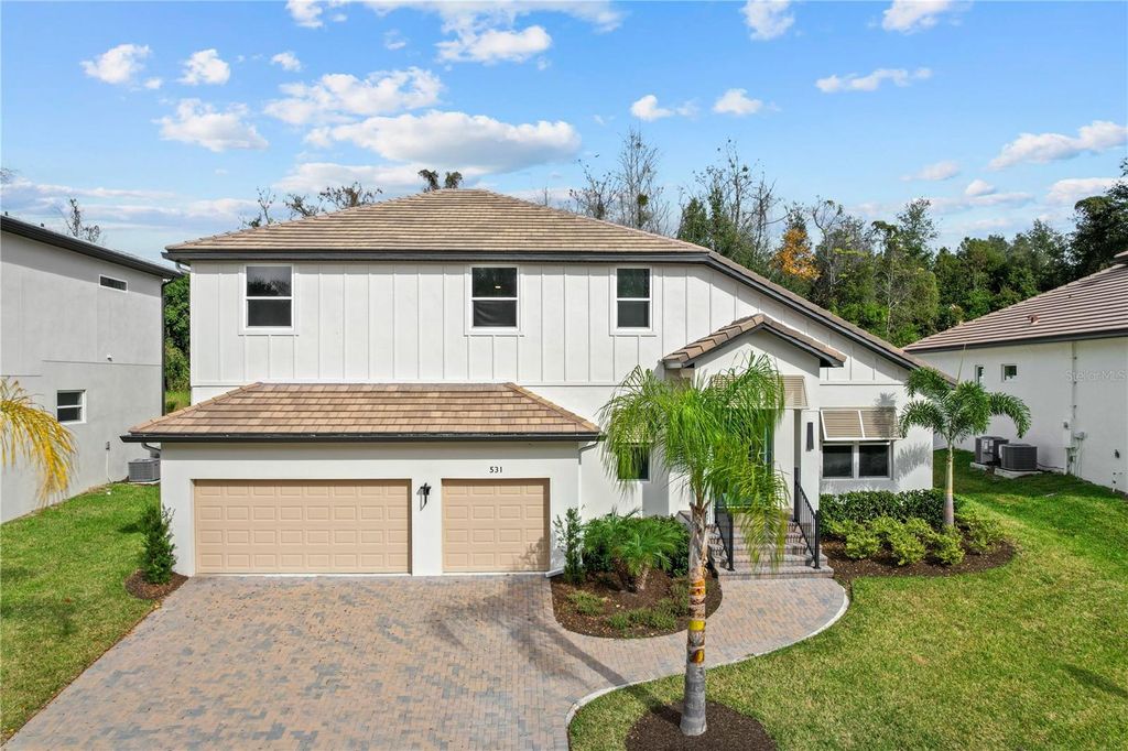 Photo of 531 Sanctuary Golf Place, Apopka, FL 32712 (MLS # O6373532)