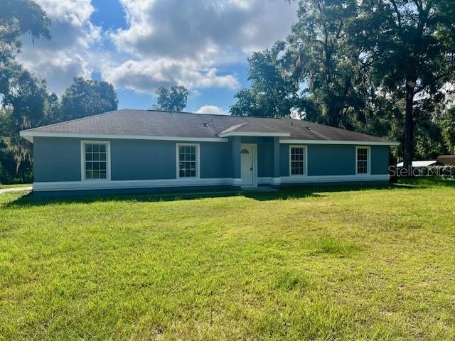 Welcome home to this spacious four bedroom home positioned on over an acre of land in scenic Summerfield. Located in convenient location to Ocala, Belleview, and The Villages.