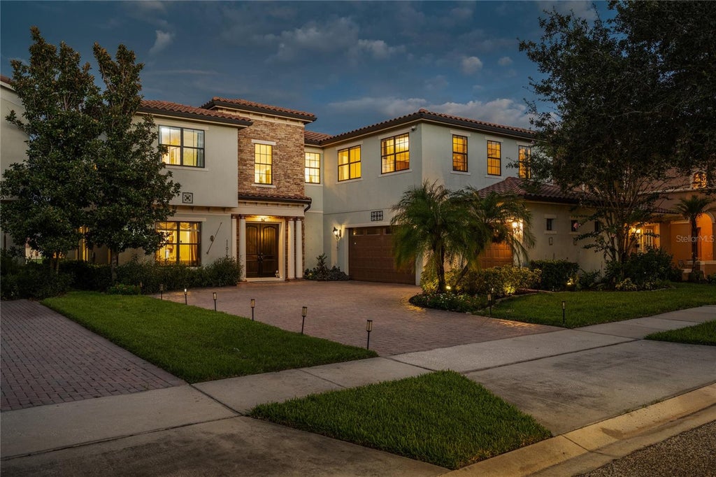 Photo of 11015 Mobberley Circle, Orlando, FL 32832 (MLS # O6436345)