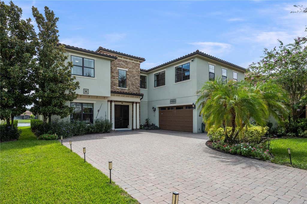 Photo of 11015 Mobberley Circle, Orlando, FL 32832 (MLS # O6436345)