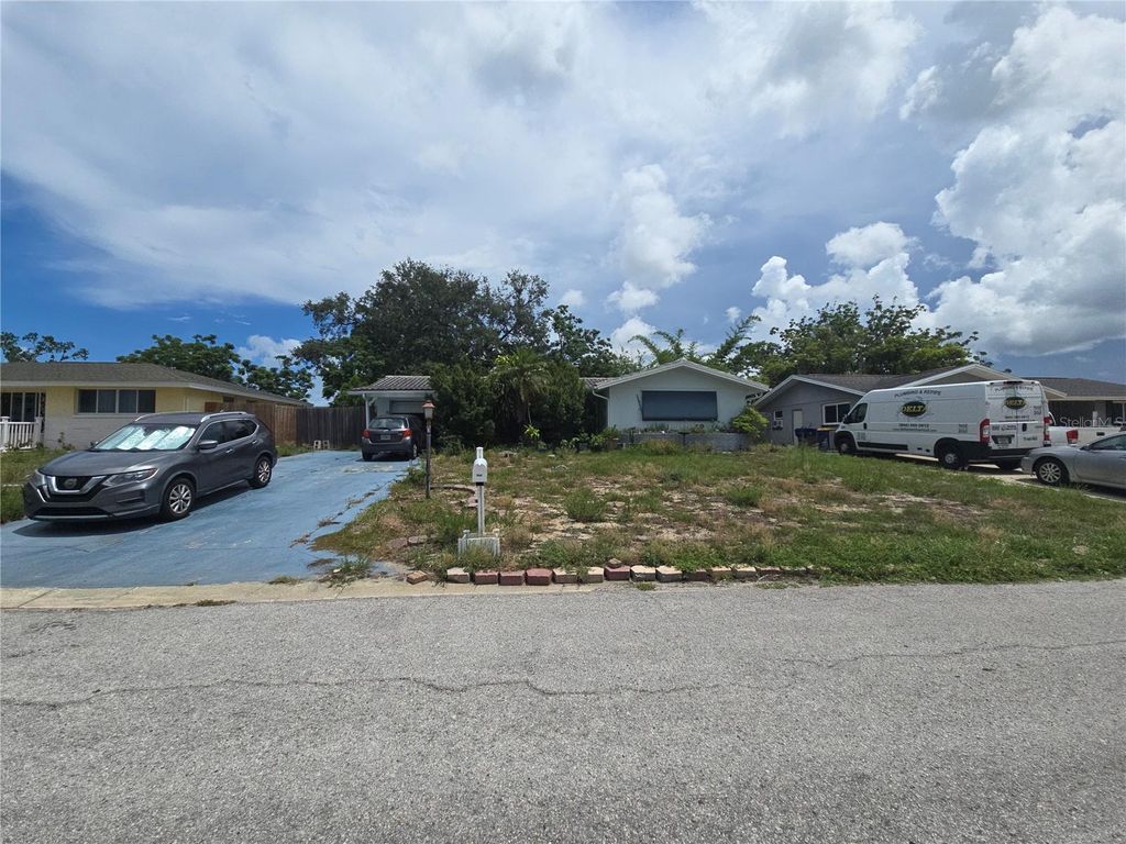 Photo of 7809 Waxwood Drive, Port Richey, FL 34668 (MLS # A4699644)