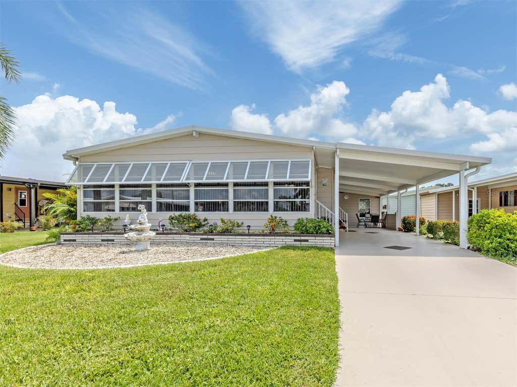 Photo of 182 Palm Harbor Drive, North Port, FL 34287 (MLS # N6145284)