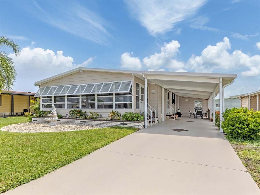 Photo of 182 Palm Harbor Drive, North Port, FL 34287 (MLS # N6145284)