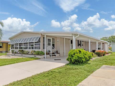 Photo of 182 Palm Harbor Drive, North Port, FL 34287 (MLS # N6145284)
