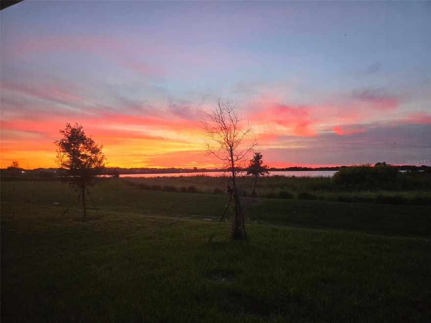 In this LAKEFRONT home, UPGRADES ABOUND! NO BACKYARD NEIGHBORS, green space for pets! This is not your standard home. Built by Richmond American Homes, this company stands out and has been praised for their floorplans and affordability. EXTRA UPGRADES the owner added, give this home additional charm your standard home would not have. Architectural shingles, upgraded faucets, quartz kitchen countertops, solid surface countertops in baths are just a few. These are the UPGRADES anyone custom building would choose for themselves. The open living space downstairs with a large family room, dining room, kitchen, back porch combo, to enjoy morning and night lake views; wildlife and sunsets will achieve the serenity you are looking for, without breaking your bank! Oversized rooms will allow a family to live comfortably. The oversized community POOL with plenty of seats to lounge, will be a favorite spot for the family to play and relax. Several playgrounds and fishing pier are close by. QUICK FACT-ACCESS TO I-4, shopping, hospitals, and all of CENTRAL FLORIDA'S PLAYGROUND are just a hop skip and a jump away!