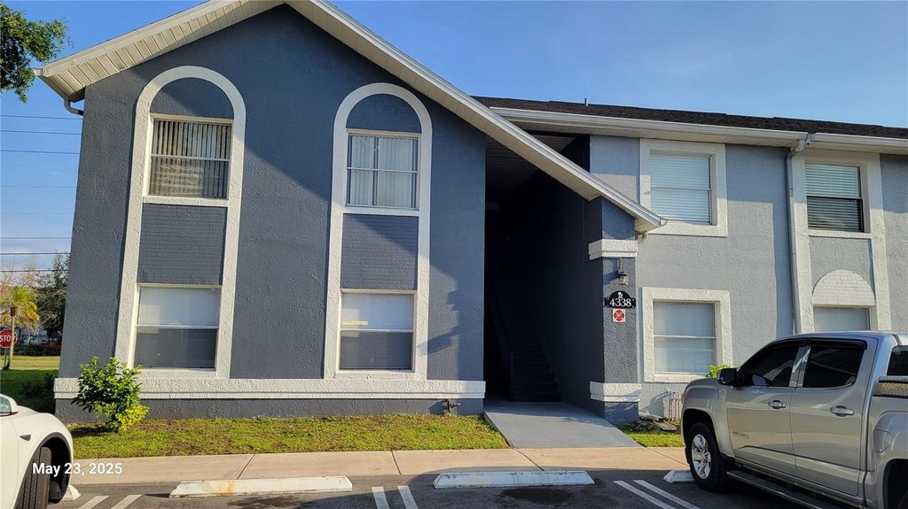 Photo of 4338 Pershing Pointe Place #3, Orlando, FL 32822 (MLS # O6407002)