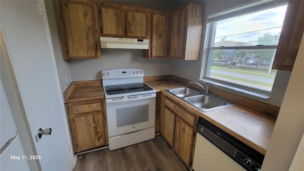 Photo of 4338 Pershing Pointe Place #3, Orlando, FL 32822 (MLS # O6407002)