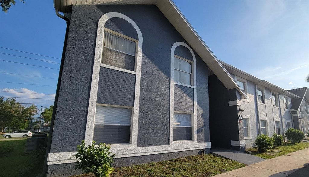 Photo of 4338 Pershing Pointe Place #3, Orlando, FL 32822 (MLS # O6407002)