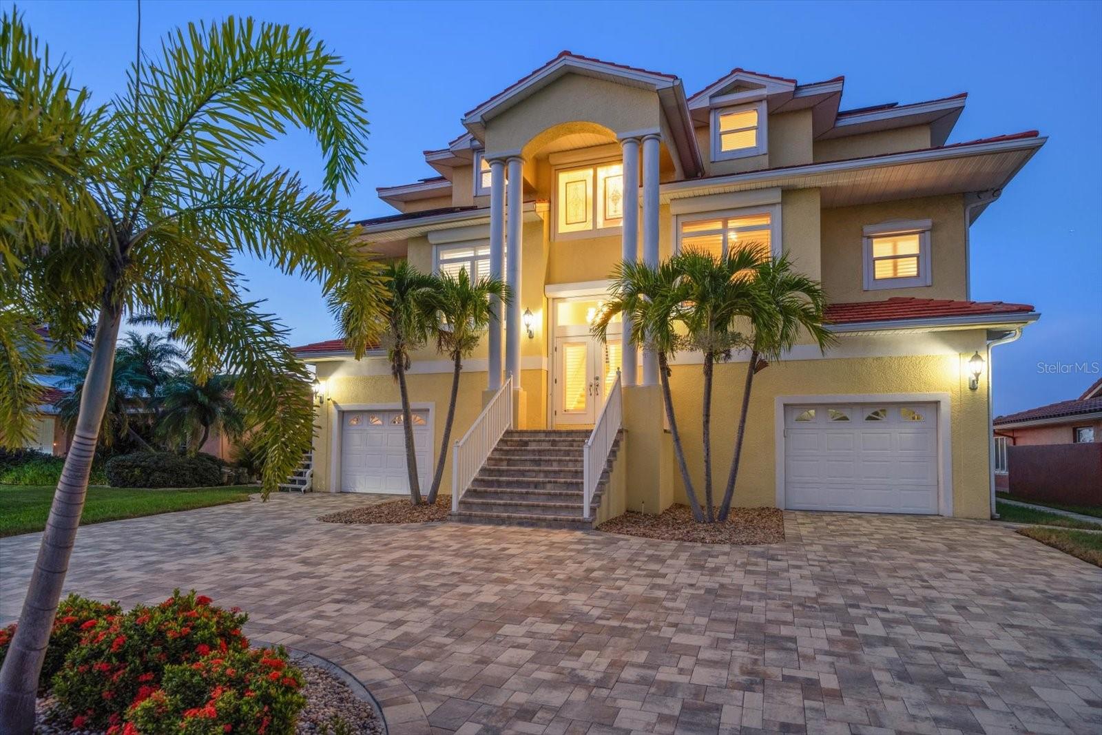 Welcome home to your boater’s dream and entertainers paradise. This move -in ready, meticulously remodeled 4 bd 4 bath, high and dry property sits on the first canal to open water in the heart of the desirable Gulf Harbors community. A waterfront retreat boasting high end upgrades, quick direct gulf access and amazing sunsets! Your private (deep water) dock with a 10,000 lb. boat lift, composite decking, water/electric hookup and a concrete seawall elevates the boating lifestyle. Head out and enjoy world-class fishing, numerous restaurants, island hopping and short trips to both north and south destinations, such as Clearwater Beach, Tarpon Springs and the Cottee river just to name a few. Upon arrival the grandeur of this home is sure to impress, with its circular paved driveway and split dual garages. Both equipped with 220 electric vehicle plugs, ample space for cars, toys and extra storage. The convenience of a pool bath and industrial indestructible stainless steel style kitchen with slip free epoxy floor make outdoor entertaining easy. An oversized ELEVATOR provides ease to rise to the elevated main level. Here you are greeted with an abundance of natural lighting that showcases the well-designed floor plan. Whether your style is formal or casual you’ll enjoy expansive spaces that are open and inviting. A gleaming new kitchen features an oversized island with plenty of seating, high end Bosch and GE Cafe stainless steel appliances, stunning quartz countertop, a walk-in pantry and a large laundry room. Open the plantation shutters and watch the marine life right from the kitchen table, or out on your screened porch, which provides a staircase down to your expansive outdoor oasis perfect for year round entertaining. This main floor offers an easy living lifestyle where you will find a beautiful primary suite overlooking the water, pool/spa, with french doors to a screened porch. Find a gorgeous luxurious ensuite with high end finishes and brand new custom his and her closets. Additionally, a guest room or office as well as a half bath sit at this main level. The sunlit 3rd floor presents an amazing gathering room with sliders opening out onto a fabulous deck with breathtaking views. This level features two large separate guest wings with their own impeccable spa like ensuites, new in 2024. If you are ready to live every day as if you are on vacation, look no further. Relax under your Tiki Bar, fire up the firepit, check out your grilling skills on the brand new Pit Boss flat top grill, soak in the hot tub or float in your saltwater pool-it’s all up to you! Feeling social? Active community civic association with multiple clubs such as a Social club, Sailing club, card club, Women's Club, fishing club and many more.... Take a GOLF CART ride to one of the regular events or activities at the clubhouse. YES- this is a golf cart friendly neighborhood. Join the beach club where you will have access to the pristine private beach boasting 21 cabanas, numerous picnic areas , and private restrooms with showers.
Only an hour away from both Tampa and Clearwater airports, easy day trips to several rivers and springs, 5 minutes to historic downtown New Port Richey, 30 minutes to Tarpon Springs and more. 3339 Seaway Drive is a rare opportunity to live the coastal lifestyle in your piece of waterfront heaven.