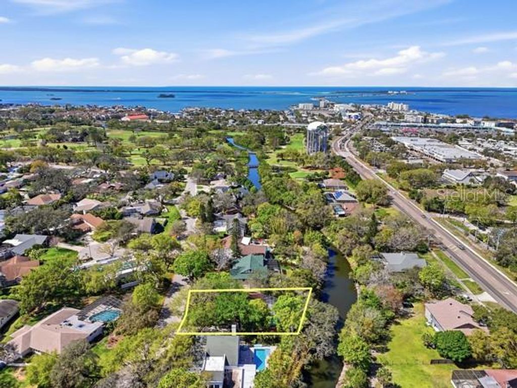 Photo of 1212 Weybridge Lane, Dunedin, FL 34698 (MLS # TB8491733)