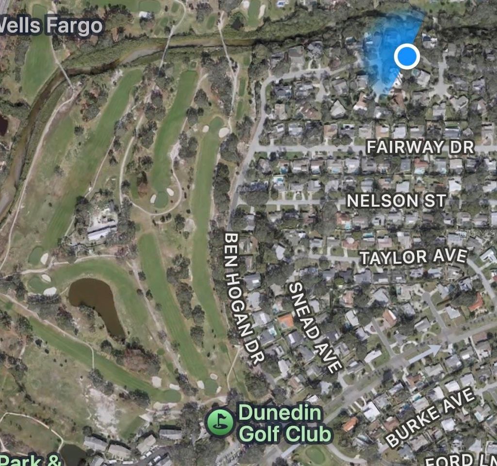 Photo of 1212 Weybridge Lane, Dunedin, FL 34698 (MLS # TB8491733)