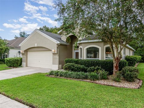 Photo of 5710 Magnolia Bloom Ter, Oviedo, FL 32765 (MLS # O6339264)