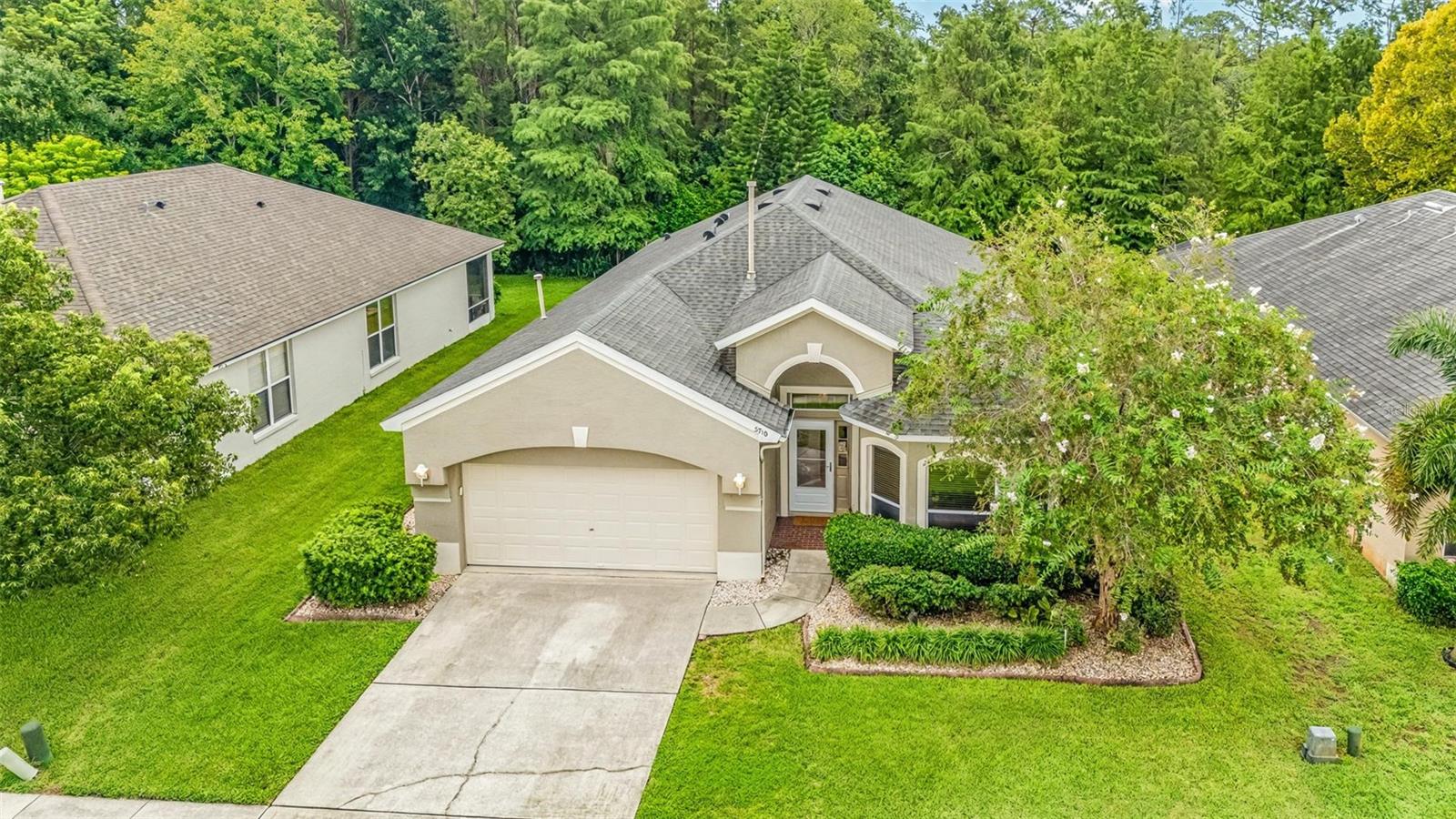 Incredible opportunity to own a 4 bedroom, 3 (Full) bath home in the sought-after Aloma Woods community on CONSERVATION!! Designed with a 3-way split floor plan, the home features spacious bedrooms, soaring vaulted ceilings, and an open-concept kitchen that flows seamlessly into the living and dining areas; making it ideal for both everyday living and entertaining. Large windows throughout capture natural light and frame peaceful green space, while ceramic tile and wood laminate flooring (no carpet anywhere!) provide style and easy maintenance.
Lovingly built and cared for by the original owner, the property reflects true pride of ownership. Thoughtful upgrades include extra insulation in the garage to help keep utility costs low (averaging under $200/month), and a spacious extended screen-enclosed patio that’s the perfect place to relax and enjoy year-round Florida living surrounded by nature.
Community amenities include a community pool, playground, and pet stations, while the convenient location places you just minutes from SR-417, shopping, dining, and all the activities that make Oviedo such a desirable place to call home. Zoned for top-rated Seminole County schools, this conservation-lot home combines privacy, comfort, and location a wonderful opportunity to live in the vibrant Aloma Woods neighborhood.