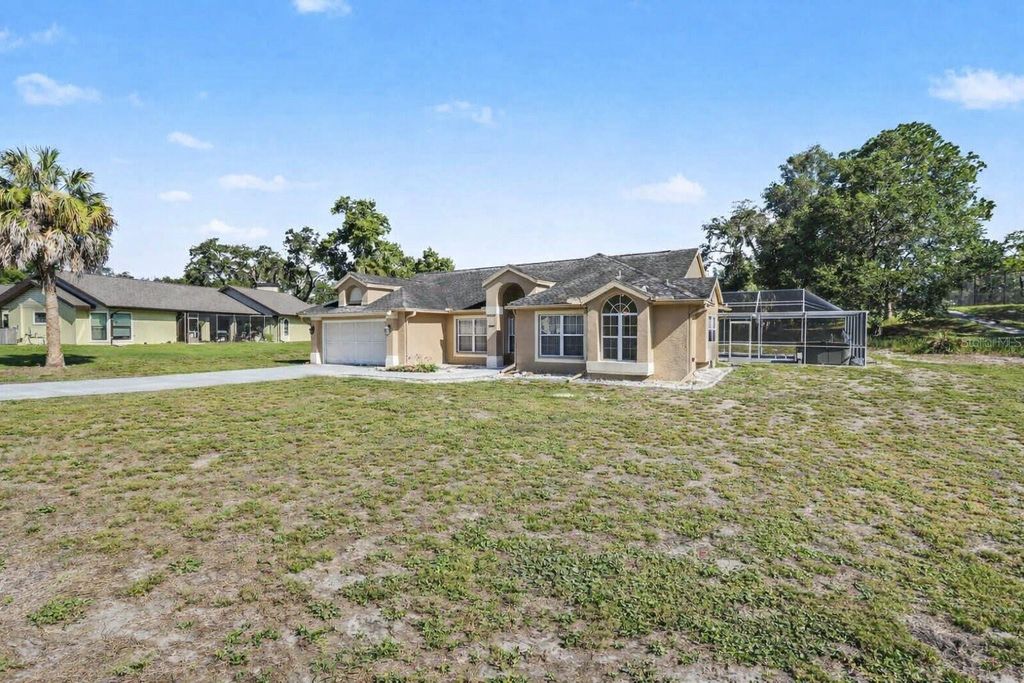 Photo of 13037 Everard Drive, Spring Hill, FL 34609 (MLS # TB8517073)