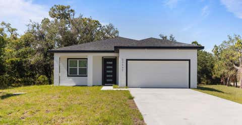 Photo of 20462 Kenilworth Boulevard, Port Charlotte, FL 33954 (MLS # C7527081)