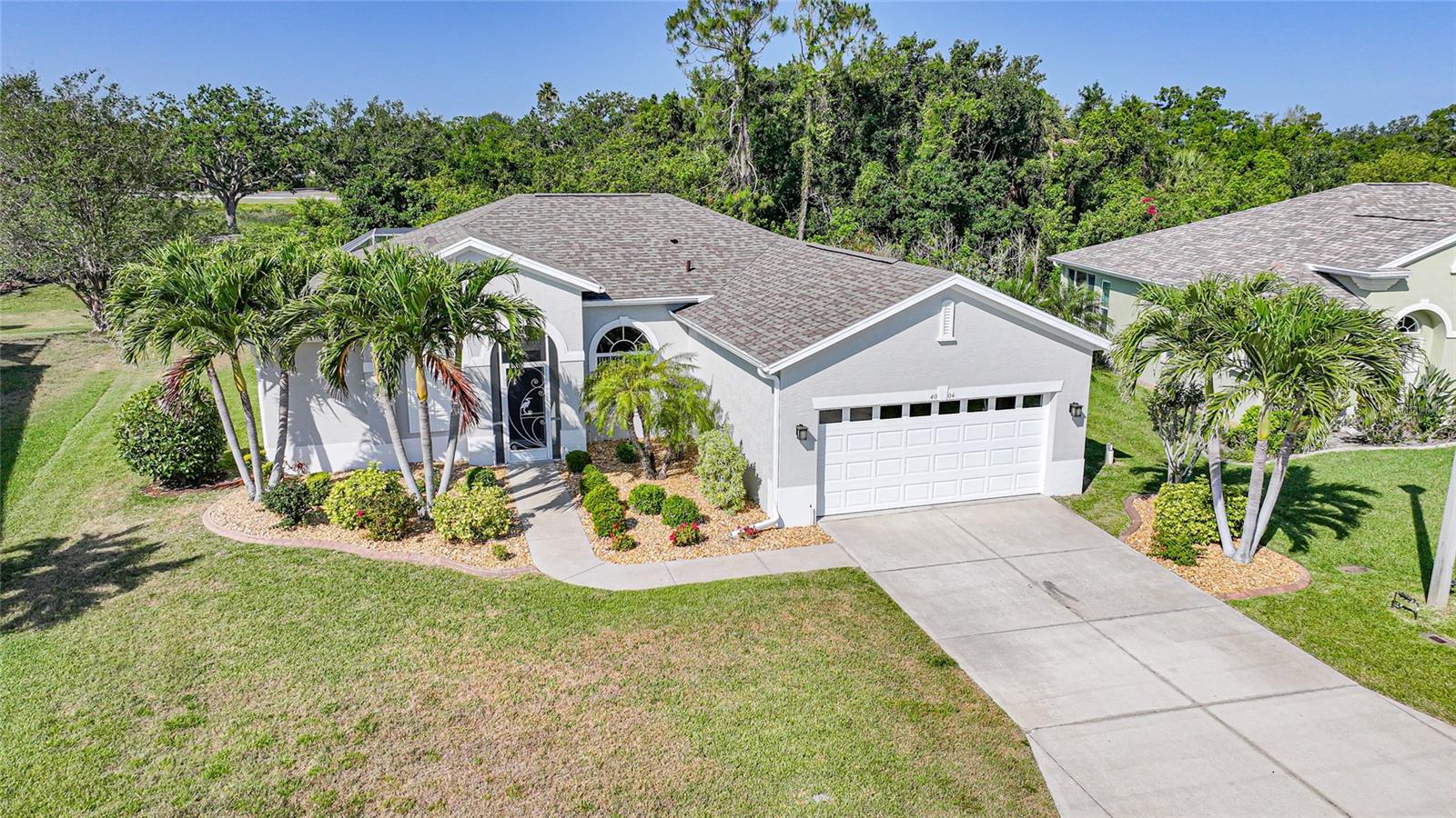 PRICE DECREASE!! Welcome to your slice of paradise located on a QUIET CUL-DE-SAC street in the vibrant heart of VENICE, FL within the Woodmere Lakes neighborhood! This charming residence seamlessly blends comfort with functionality featuring abundant NATURAL LIGHT that fills the generous living areas accentuating the home's meticulous upkeep. The OPEN CONCEPT DESIGN integrates the living, dining and kitchen spaces creating an inviting atmosphere for both relaxing and entertaining. There is NO CARPET here; instead, PORCELAIN PLANK tile graces the bedrooms and living room while ceramic tile covers the remaining areas.
<br>
<br>
The spacious primary suite serves as a lavish retreat featuring a LARGE WALK-IN CLOSET and a spa-like bathroom equipped with a SOAKING TUB, separate shower and there is room for oversized furniture as well! Two additional bedrooms present versatile options for guests or a home office. The bright and airy kitchen boasts ample counter space, a double ceramic sink, a generous pantry closet and a cozy breakfast nook overlooking the tranquil backyard. Family and friend meal gatherings can be enjoyed in your DINING ROOM area for a more formal feel! Adjacent to the kitchen is an INSIDE LAUNDRY ROOM with newer washer and dryer and added cabinet space for storage!
<br>
<br>
Step outside to your private haven to an EXPANSIVE SCREENED-IN and CAGED PATIO area with beautiful BRICK PAVERS, a covered HOT TUB and a GAS FIRE PIT to enjoy on the rare cooler evenings and surrounded by mature trees and LUSH LANDSCAPING, with no neighbors behind you for ultimate PRIVACY!! Maintaining your lawn is simple thanks to your own well for IRRIGATION eliminating concerns about water bills. The exterior also features ROLL-DOWN electric HURRICANE SHUTTERS in the rear, rain gutters, a fresh paint job and REMOTE-CONTROLLED LIGHTING and spotlights that create a serene evening ambiance both in the yard and lanai. Roof 2021, well pump 2021, newer AC blower and newer microwave are all just a few of the recent updates as well!
<br>
<br>
This home is situated in an X Flood Zone which could exempt you from flood insurance requirements and it has remained untouched through all the recent storms! The community offers a low semi-annual HOA fee, NO CDD FEES, city water/sewer, UNDERGROUND UTILITIES, pedestrian friendly sidewalks and much more!!! Within minutes, you can access renowned golf courses, PRISTINE GULF BEACHES like Nokomis, Venice and Manasota as well as nearby attractions including the new Costco, Wellen Park District, the Atlanta Braves spring training stadium and of course, DOWNTOWN VENICE featuring various boutiques, eateries and cultural venues. Outdoor lovers will enjoy close proximity to parks, walking trails and local dog park right around the corner! Top-rated schools are also nearby with regional airports such as Sarasota within easy reach. A wide array of restaurants and shops are within reach by foot as well....so what are you waiting for?? Make your appointment today!!!