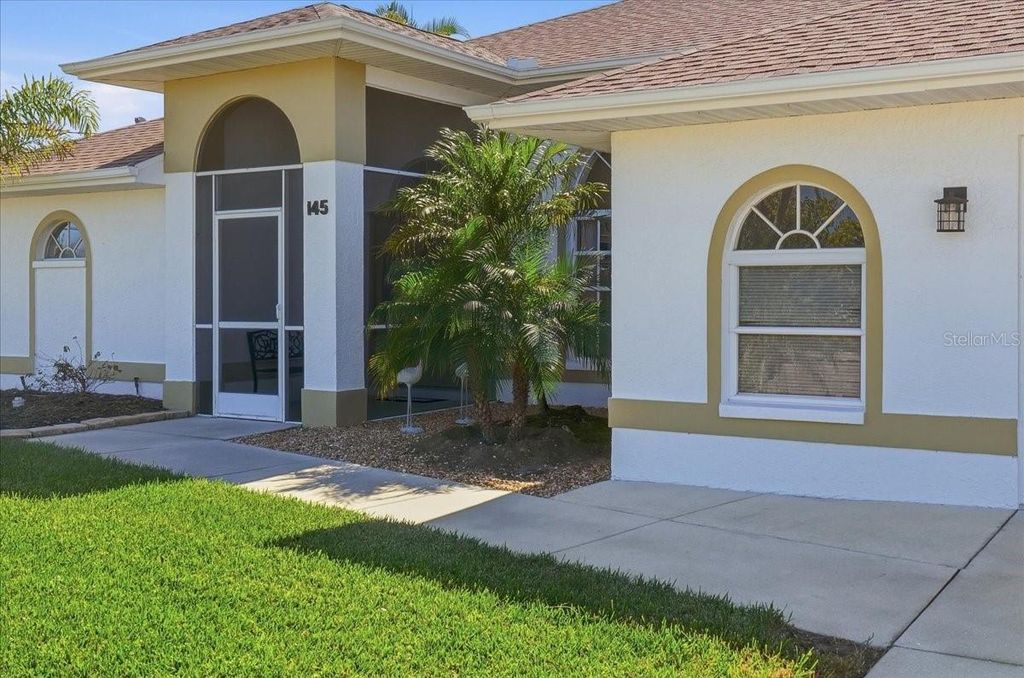 Photo of 145 Francis Drive NE, Port Charlotte, FL 33952 (MLS # C7521407)