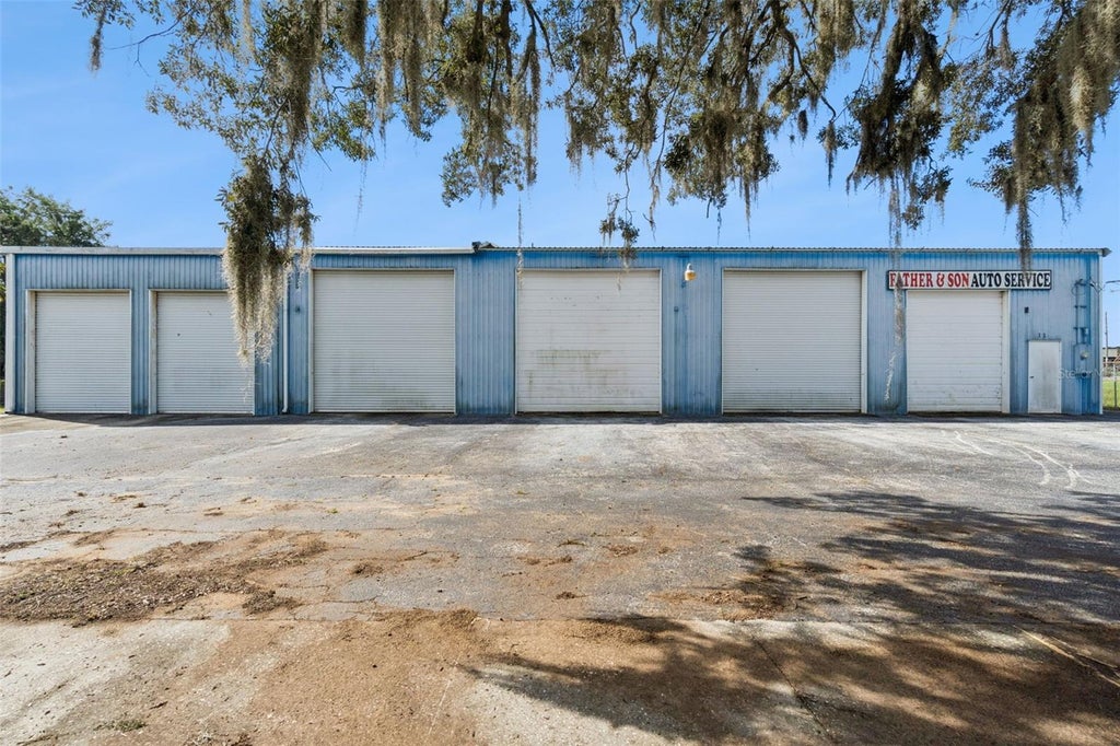Photo of 11 W Magnolia Street, Davenport, FL 33837 (MLS # O6440465)