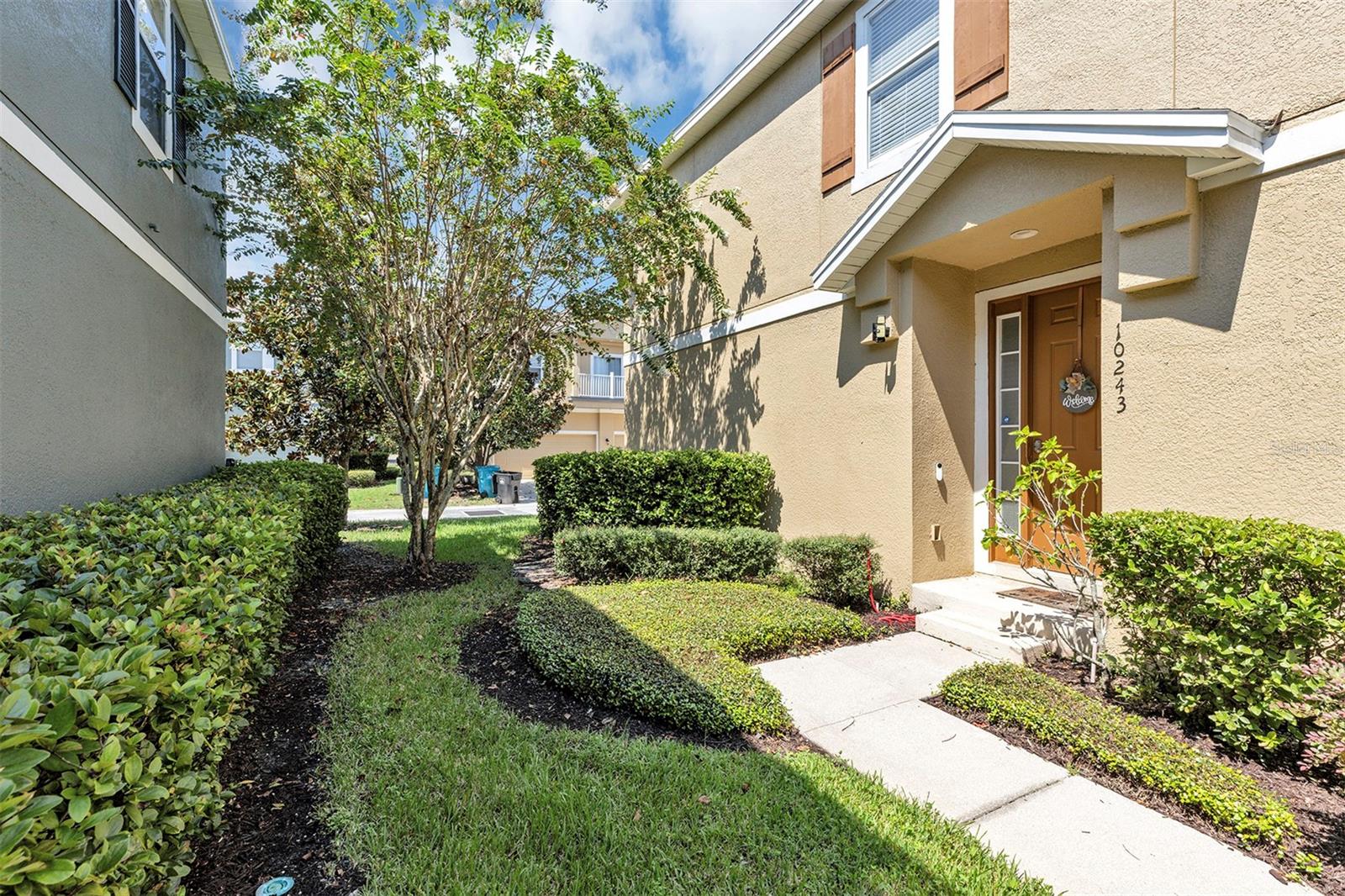 Prime investment or starter home in Lake Nona! Located in the highly desirable Villas at East Park community, this spacious 2BR/2BA home features a bright open floor plan, abundant natural light, tranquel views surrounded by lush, mature trees , and a private rear-entry garage! Featuring an open-concept layout, the combined living and dining area is filled with natural light from two sets of sliding glass doors that open to a charming Juliet balcony. Recent updates include a newer a/c, luxury vinyl plank flooring, water heater (2023), roof (2023), making this property move-in ready with excellent rental potential. Community amenities include tennis & pickleball courts, sand volleyball, fishing pier, sailable lake, multiple parks, playground, dog park, and scenic trails. Just minutes from Medical City, USTA, KPMG, Amazon, Lake Nona Town Center, Boxi Park, shopping, dining, and Orlando International Airport with easy access to 417 & 528, and minutes from the brand new Orlando Health Hospital. Perfect for investors or first-time buyers seeking lifestyle, location, and long-term value. Schedule your private showing today!