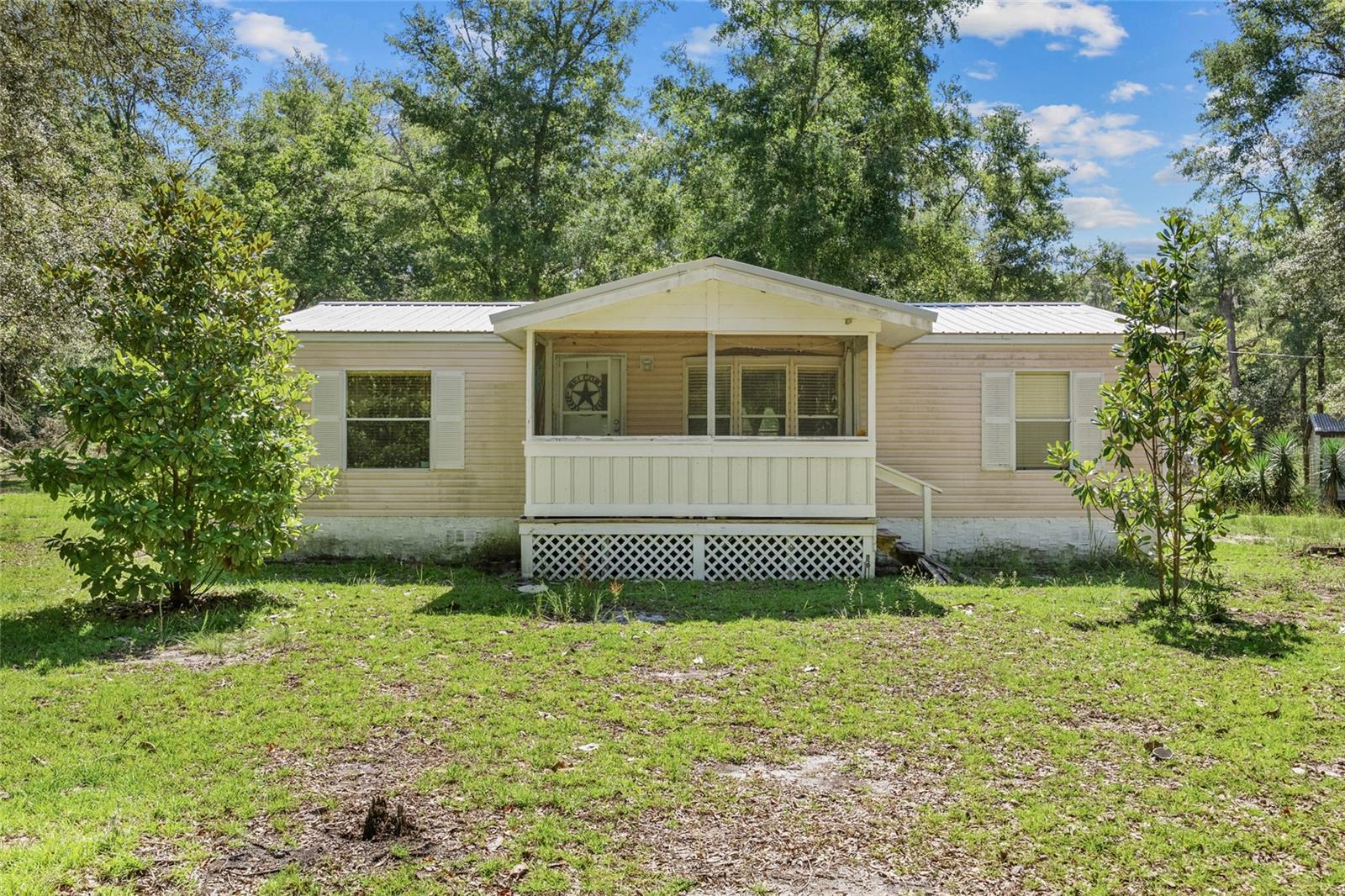 Charming 3-Bedroom, 2-Bathroom Home on 5 Beautiful Acres!
Escape to your own private country retreat with this adorable home nestled on 5 fenced and cross-fenced acres — perfect for all your animals and outdoor dreams! Relax or entertain on the inviting front and back porches while taking in peaceful views of abundant wildlife and serene surroundings. This property comes with no HOA or deed restrictions, giving you the freedom to truly make it your own. Recent upgrades add modern comfort and value, including a new HVAC (2024) with heat pump and Bluetooth thermostat, new stainless steel appliances, new flooring in the living area and primary bedroom, updated light fixtures, countertops, bathroom vanities, faucets, walk-in showers, and toilets. A small shed and a separate storage building provide plenty of space for tools, equipment, or hobbies. Ideally located just minutes from Bell, the Suwannee and Santa Fe Rivers, and Florida’s famous springs, with convenient access to Gainesville and Lake City for work, shopping, and entertainment.
Bring your animals, bring your dreams — this peaceful slice of country living won’t last long!