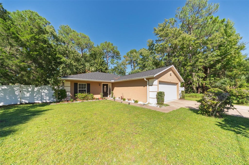 Photo of 37 Postman Lane, Palm Coast, FL 32164 (MLS # FC322119)