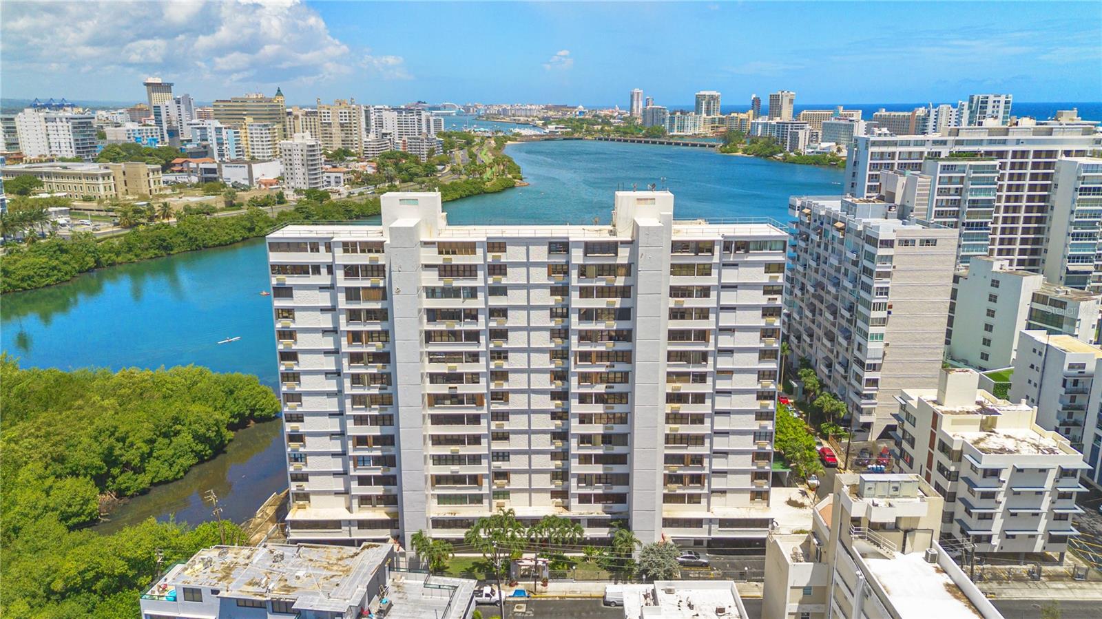 Architectural Design , fully renovated. Floor plan redesigned to maximize functionality, comfort and additional storage spaces. Includes appliances, furniture, ready to move in. Three bedrooms plus den. The kitchen has soft close cabinets, pantry with pull out drawers, all Thermador appliances. Direct view the the Lagoon and the Condado and Miramar skyline. Walking distance to the beach, hotels, restaurants and schools. One of the few buildings with a pool. Basketball court, one covered parking space. Additional parking spaces available on a condominium raffle basis. Prestige residential location with easy in an out car access and only one block from Ashford, near la Ventana del Mar.