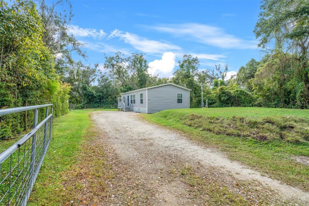 Photo of 18048 Evening Star Avenue, Brooksville, FL 34604 (MLS # TB8440027)