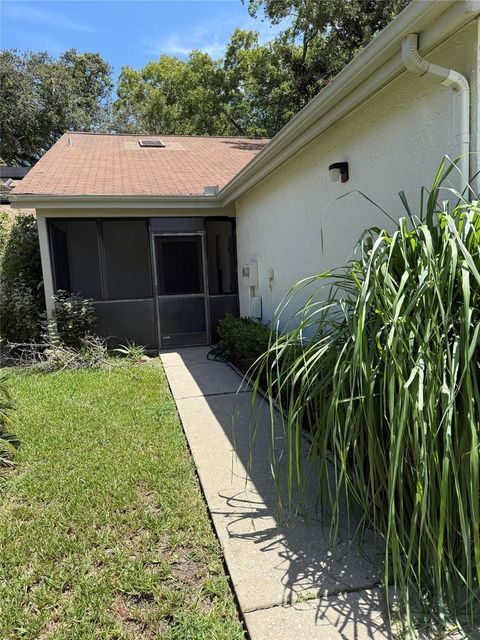 Photo of 11746 Spring Tree Lane, Port Richey, FL 34668 (MLS # O6360619)