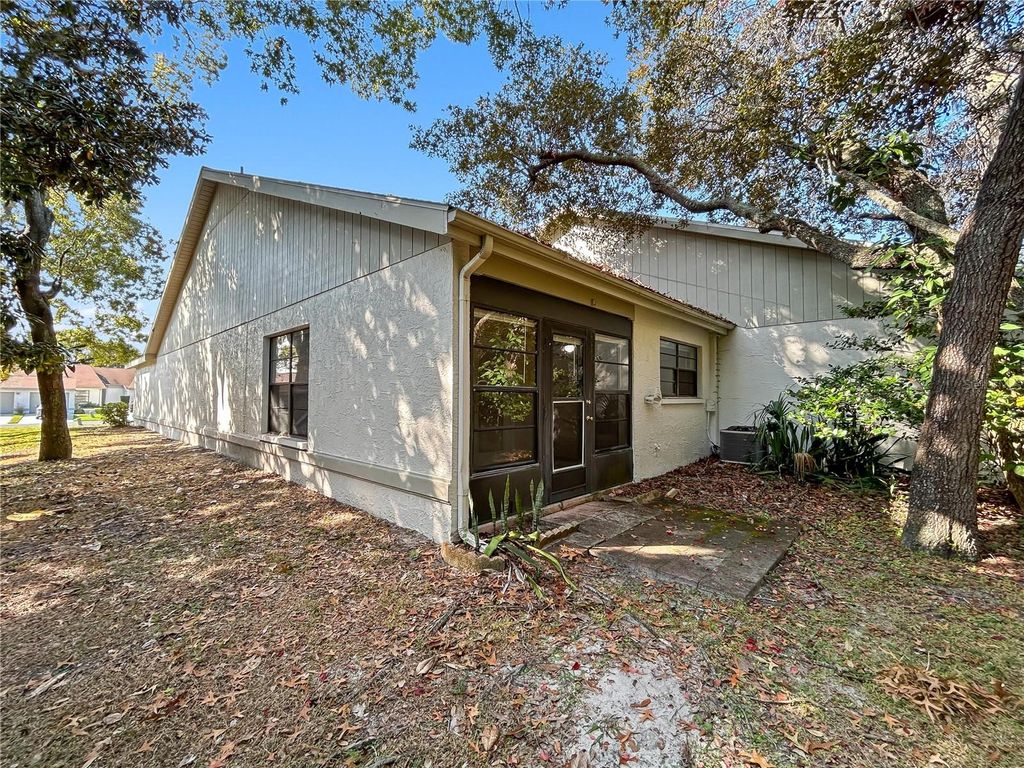 Photo of 11746 Spring Tree Lane, Port Richey, FL 34668 (MLS # O6360619)