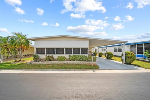 Photo of 10359 S Lake Drive #238, Largo, FL 33773 (MLS # TB8381145)