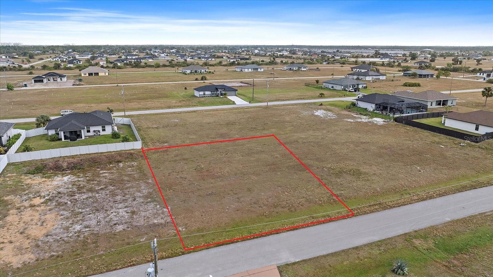 Discover the perfect canvas for your dream home at 3915 NW 38th Ln in the vibrant community of Cape Coral, FL. This cleared, ready-to-build lot offers a rare blend of tranquility and convenience, making it the ideal spot for your future residence. Imagine being just moments away from glistening sandy beaches, perfect for a day under the sun or engaging in a variety of water sports. With nearby parks and trails, your options for outdoor activities are limitless, ensuring a lifestyle that's both active and at peace with nature. Don't miss this chance to build in a serene residential area that's fast becoming sought-after for its proximity to both leisure and loveliness. Make this lot the starting point for a lifetime of memories in a community that's as welcoming as it is beautiful.