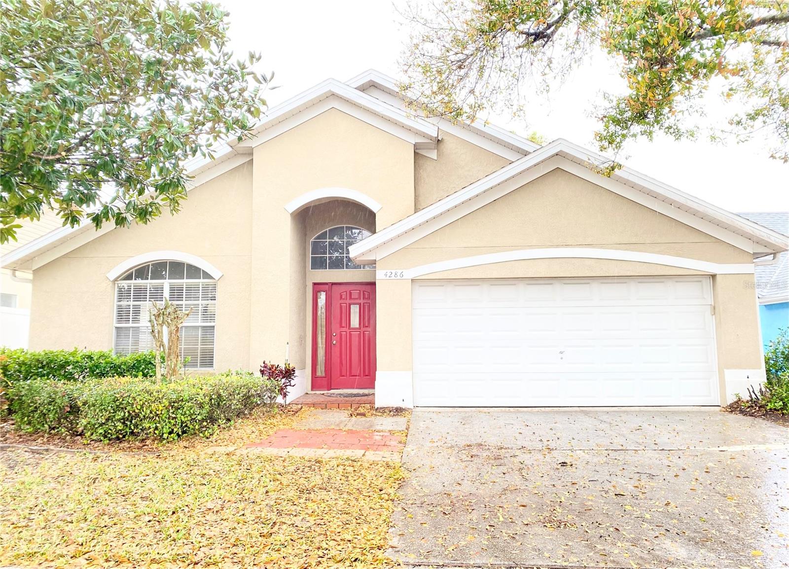 Absolutely stunning three-bedroom, two-bathroom single family home! Located in the desirable Creekwood Community of Oviedo, Florida. This open concept, move in ready home is a real gem! Attractive open floor plan! Featuring high ceilings, a large fenced in backyard & patio, and sleek laminate flooring throughout! Kitchen features granite countertops, wooden cabinets, huge island, and a large pantry so you never run out of space! BRAND NEW STAINLESS STEEL GAS RANGE/STOVE and BRAND NEW STAINLESS STEEL MICROWAVE in the kitchen! The additional bedrooms are generously sized to offer plenty of room for guests or a home office! Continuing onto the screened in patio you will find sufficient space for outdoor furniture, perfect for entertaining or simply lounging in the warm Florida weather while soaking up the scenery in the fully fenced in backyard! Two car garage! Located in an established neighborhood with good schools, very close to the Waterford Lakes Town Center, Research Parkway, UCF, Valencia Community College, Lockhead Martin East Facility, and Disney! Easy access to the 408, 417 and the Orlando International Airport. This home SHINES, both inside and out. Come see all that it has to offer! Schedule a viewing and apply to live in this beautiful home today!